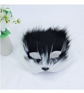Detail of faux fur animal mask with black and white texture for Halloween party