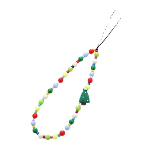 Christmas beaded phone strap with colorful pearls and green tree pendant on white backdrop