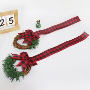 Christmas cabinet wreaths set with red and black buffalo plaid bows on white background