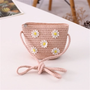 Pink straw woven crossbody bag for kids featuring 3D daisy embroidery and rope strap