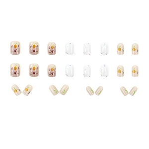 Cute cartoon orange and bear press-on nails set with 24 pieces in creamy white finish