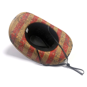 Detail view of woven cowboy hat interior featuring sweatband and adjustable chin strap