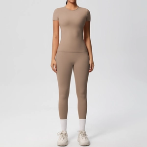 Front view of women's mocha yoga set featuring slim fit t-shirt and high waist leggings