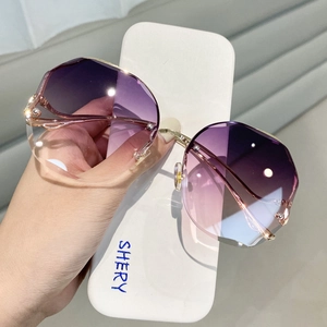 Lunettes de soleil sans monture oversize avec verres dégradés violets et métal