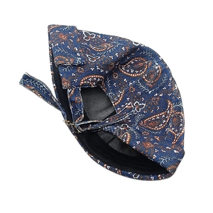 Detail of adjustable metal buckle and vintage paisley print on the corduroy docker hat