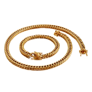 Ensemble de bijoux collier et bracelet à maille gourmette en acier doré 18 carats