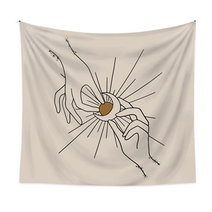 Bohemian style wall tapestry featuring sun moon and hand art on beige background