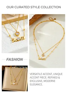 Detail of gold double-layer chain necklace featuring heart zircon and Mom pendant
