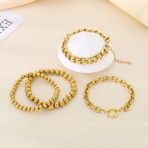 Minimalist gold-plated 4-piece bracelet set with chunky Cuban chain and beaded strands