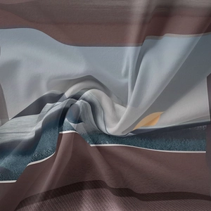 Detailed macro view of soft chiffon tapestry fabric with abstract geometric patterns