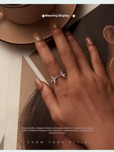 Detailed close-up of a 925 sterling silver flying bird ring in a lifestyle setting