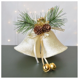 Detail of velvet Christmas bells with natural pine cones and festive golden berry accents