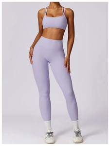 Detail of lavender high-waist seamless yoga set showing high-stretch performance fabric