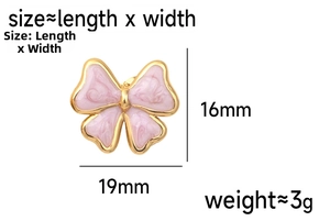 Detailed view of pink enamel bow earring with gold metal edges and 19x16mm dimensions
