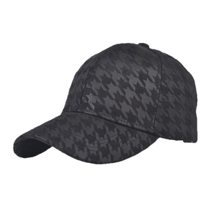 Classic black houndstooth pattern baseball cap with structured crown and curved brim