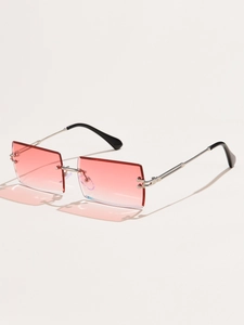 Detail view of rimless rectangular sunglasses with pink gradient lenses and silver metal temples
