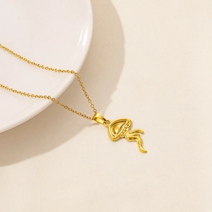 Macro view of a 18K gold plated jellyfish pendant with fine sea texture detail