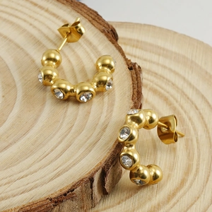Boucles d'oreilles en U en acier inoxydable doré 18 carats avec zircons cubiques clairs