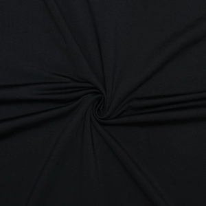 Close-up of the black soft elastic fabric showing smooth texture and elegant draping