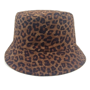 Close-up of leopard print corduroy bucket hat texture and durable stitched fabric