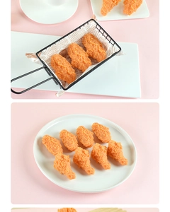 Close-up of PVC fried chicken wing and drumstick models with realistic crispy texture