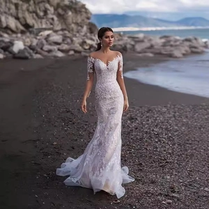 Elegant off-the-shoulder lace mermaid wedding dress with long sleeves and floral embroidery