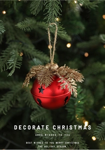 Christmas tree hanging ornament with red metal bell, pine cones and festive golden needles