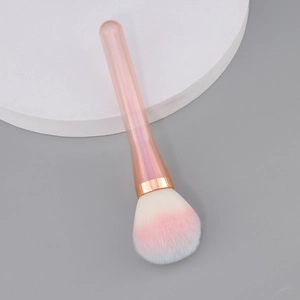 Pink gradient loose powder brush with rose gold ferrule and translucent pink handle