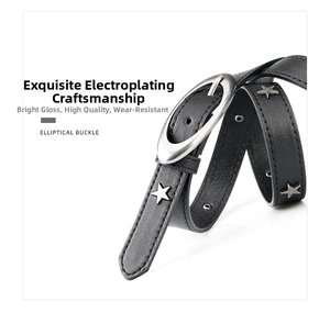 Detail of black punk belt featuring silver star rivets and a vintage elliptical buckle