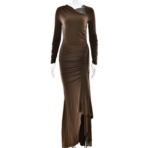 Detail of a brown asymmetric floor-length dress featuring ruched waist and slit hemline