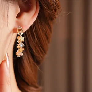 Elegant gold-plated C-shaped star earrings with sparkling zircon crystals for women