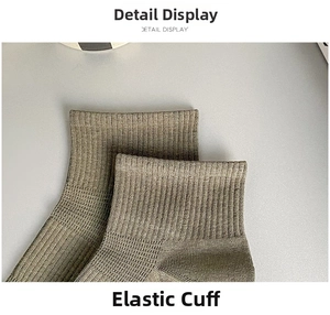 Detail display of the high elasticity ribbed cuff on olive green cotton socks