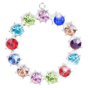 Macro shot of colorful rhinestones on a stainless steel ring pendant with star-shine effects