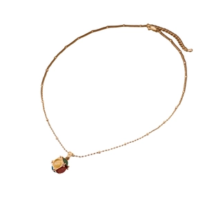 18K gold plated necklace with a colorful cubic cat eye stone pendant on white background