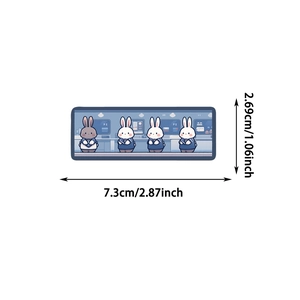 Detailed view showing the exact dimensions of cute blue bunny cartoon stickers in cm and inches