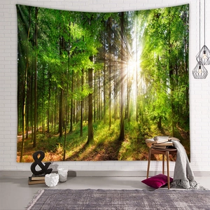 Detailed view of forest tapestry hanging on white brick wall with natural sunlight
