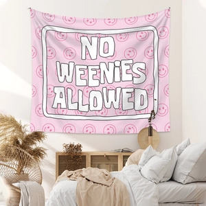Pink bohemian tapestry with No Weenies Allowed text and smiley faces for wall decor