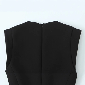 Black sleeveless romper featuring a back invisible zipper and round neckline detail