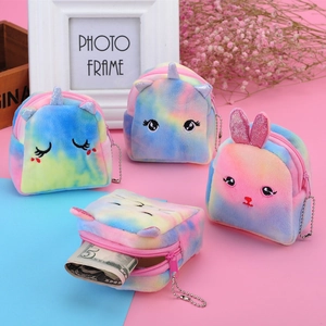 Close-up of cute plush animal coin purses with tie-dye fabric and silver bead chains
