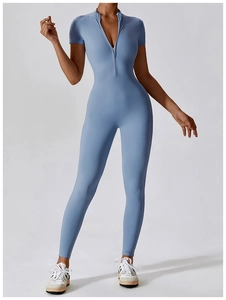Close-up of light blue short sleeve unitard with front zipper detail for fitness