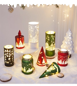 Detail of decorative Christmas LED lanterns with warm lighting and hollow-out patterns