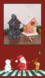 Detailed view of Halloween ghost house and Christmas gingerbread house festive ornaments