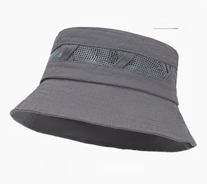 Detail view of the gray breathable mesh panel and decorative straps on the cotton sun hat