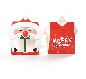 Détail de la boîte cadeau de Noël avec motif Père Noël et fenêtre transparente