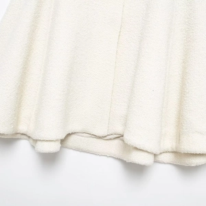 Elegant white wool blend cape coat with textured fabric and stylish stand collar