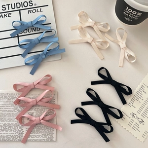 Set of 3 elegant ribbon bow hair clips for women in blue, beige, pink, and black colors