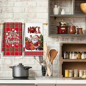 Christmas kitchen towels with festive Santa Claus and Merry Christmas plaid print detail