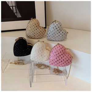 Mini heart-shaped sequin bags in multiple colors with metallic chain straps