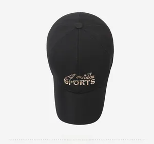 Top view of black baseball cap featuring gold embroidered Outdoor Sports logo and texture