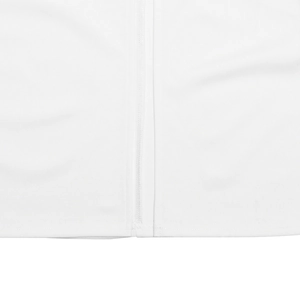 Close-up detail of white V-neck lace dress showing high-quality fabric texture and hem stitching